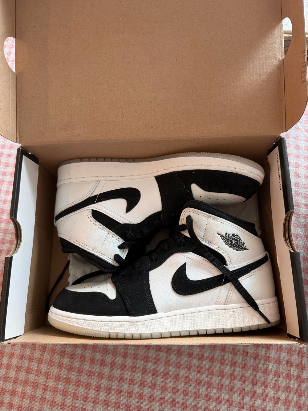 Nike Women’s Black and White Mid-Top Sneakers